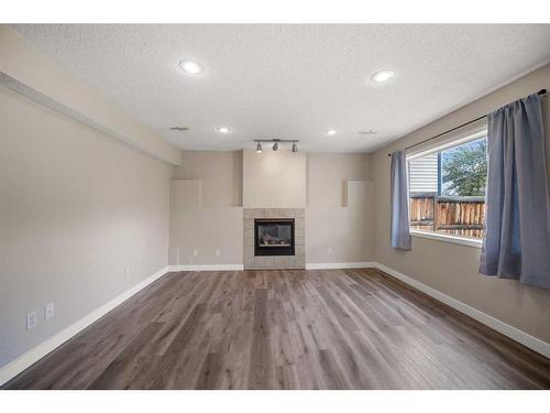 244 Citadel Way Nw, Calgary, AB - Indoor Photo Showing Other Room With Fireplace