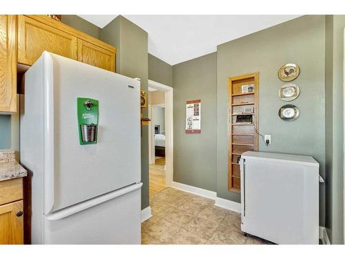 14 594 Avenue West, Rural Foothills County, AB - Indoor Photo Showing Laundry Room