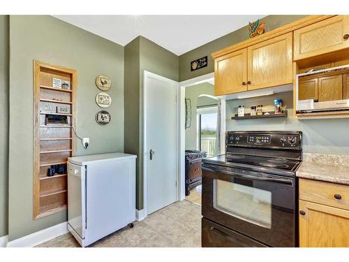 14 594 Avenue West, Rural Foothills County, AB - Indoor Photo Showing Kitchen