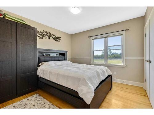 14 594 Avenue West, Rural Foothills County, AB - Indoor Photo Showing Bedroom