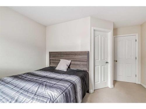 104 Panamount Manor Nw, Calgary, AB - Indoor Photo Showing Bedroom
