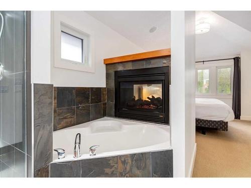1706 31 Street Sw, Calgary, AB - Indoor Photo Showing Bathroom With Fireplace