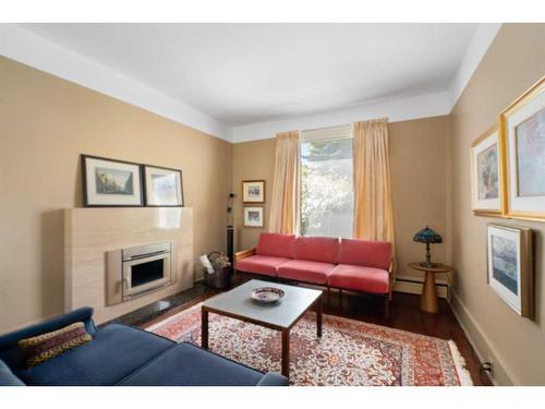 1911 11 Street Sw, Calgary, AB - Indoor Photo Showing Living Room With Fireplace