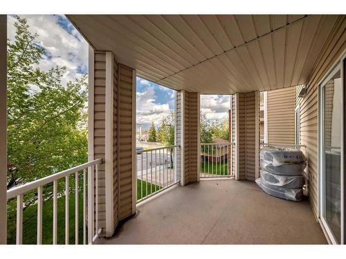 207-16 Country Village Bay Ne, Calgary, AB - Outdoor With Deck Patio Veranda With Exterior