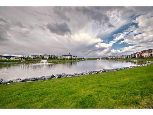 207-16 Country Village Bay Ne, Calgary, AB - Outdoor With Body Of Water With View