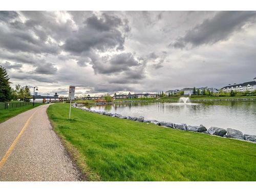 207-16 Country Village Bay Ne, Calgary, AB - Outdoor With Body Of Water With View