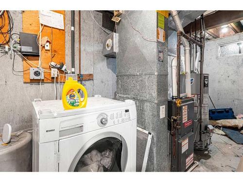 60 Templegreen Bay Ne, Calgary, AB - Indoor Photo Showing Laundry Room
