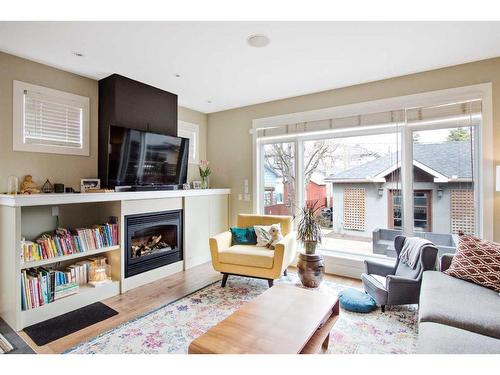 1920 49 Avenue Sw, Calgary, AB - Indoor Photo Showing Living Room With Fireplace