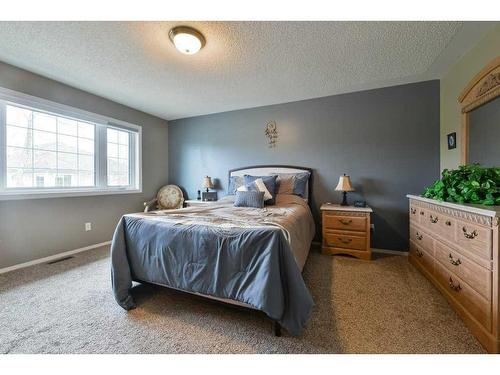 63 Sierra Morena Gardens Sw, Calgary, AB - Indoor Photo Showing Bedroom
