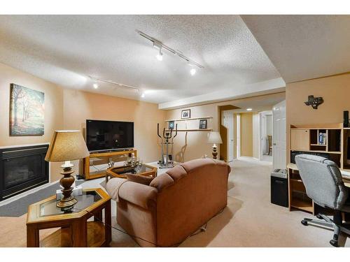 63 Sierra Morena Gardens Sw, Calgary, AB - Indoor With Fireplace