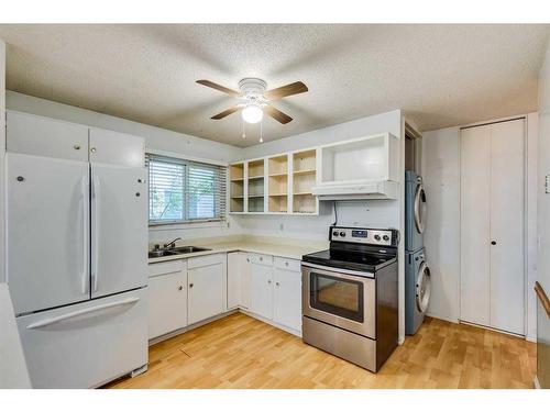 34 Aberdare Crescent Ne, Calgary, AB - Indoor Photo Showing Kitchen With Double Sink