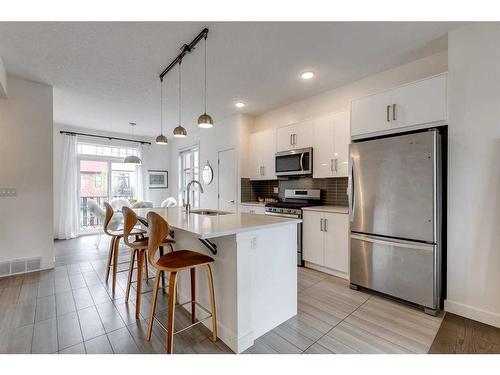 144 Walden Path Se, Calgary, AB - Indoor Photo Showing Kitchen With Stainless Steel Kitchen