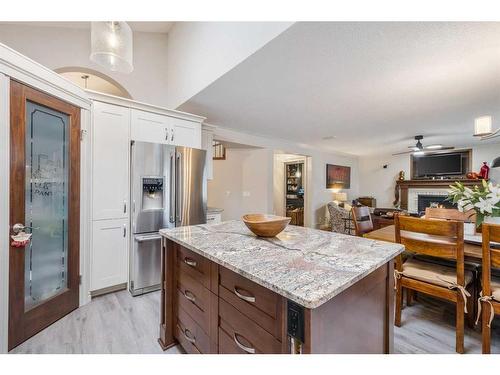 172 Woodstock Way Sw, Calgary, AB - Indoor Photo Showing Kitchen With Upgraded Kitchen