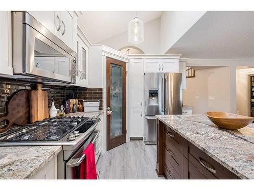 172 Woodstock Way Sw, Calgary, AB - Indoor Photo Showing Kitchen With Stainless Steel Kitchen With Upgraded Kitchen