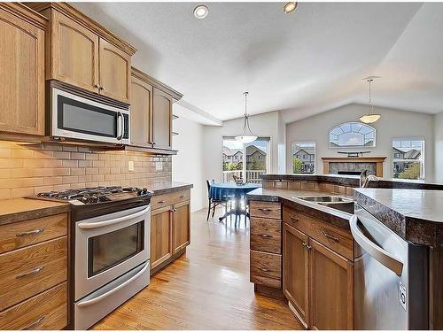 967 Bayside Drive Sw, Airdrie, AB - Indoor Photo Showing Kitchen With Double Sink