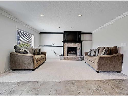 967 Bayside Drive Sw, Airdrie, AB - Indoor With Fireplace