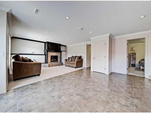 967 Bayside Drive Sw, Airdrie, AB - Indoor With Fireplace