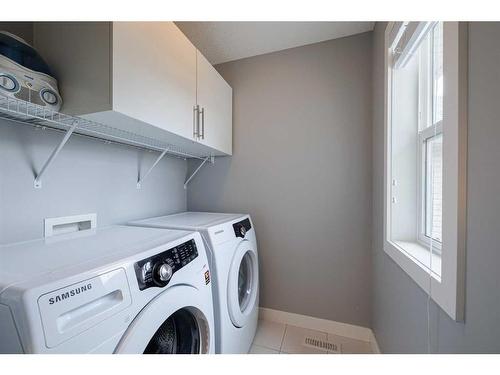 547 Panora Way Nw, Calgary, AB - Indoor Photo Showing Laundry Room