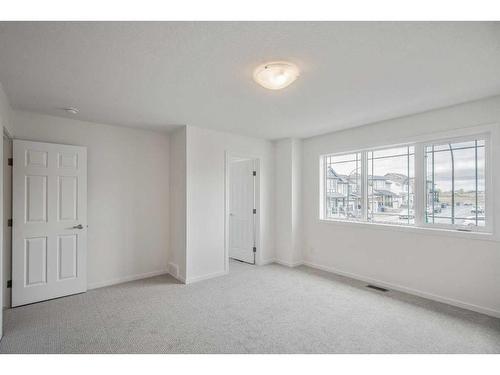 27 Carringwood Manor Nw, Calgary, AB - Indoor Photo Showing Other Room