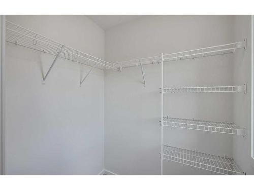 27 Carringwood Manor Nw, Calgary, AB - Indoor With Storage