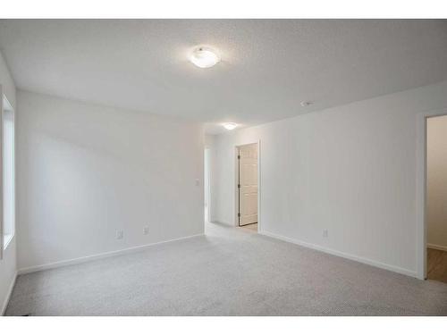 27 Carringwood Manor Nw, Calgary, AB - Indoor Photo Showing Other Room