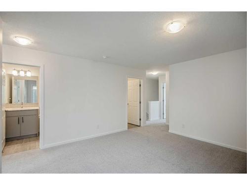 27 Carringwood Manor Nw, Calgary, AB - Indoor Photo Showing Other Room