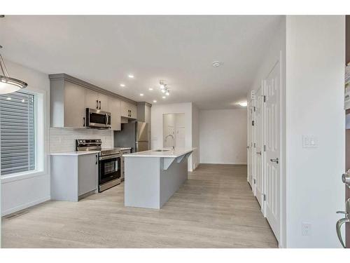 27 Carringwood Manor Nw, Calgary, AB - Indoor Photo Showing Kitchen With Upgraded Kitchen