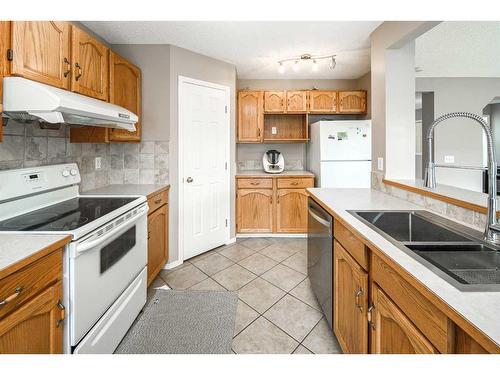 330 Citadel Drive Nw, Calgary, AB - Indoor Photo Showing Kitchen With Double Sink