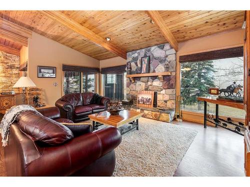 242197 64 Street West, Rural Foothills County, AB - Indoor Photo Showing Living Room With Fireplace