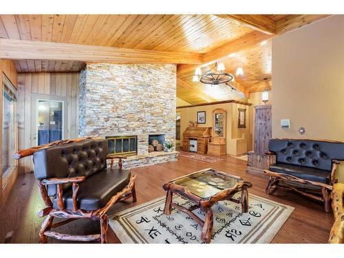 242197 64 Street West, Rural Foothills County, AB - Indoor Photo Showing Living Room With Fireplace