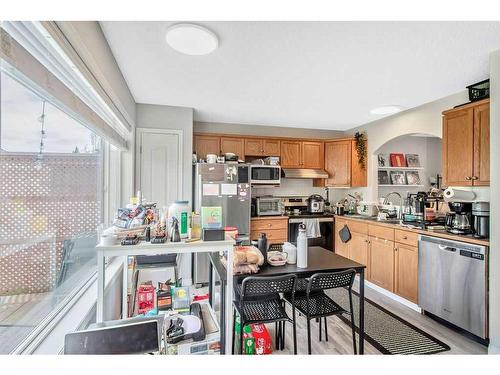 36 Cramond Drive Se, Calgary, AB - Indoor Photo Showing Kitchen With Stainless Steel Kitchen With Double Sink