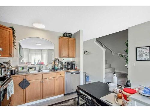 36 Cramond Drive Se, Calgary, AB - Indoor Photo Showing Kitchen With Double Sink