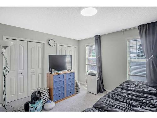 36 Cramond Drive Se, Calgary, AB - Indoor Photo Showing Bedroom