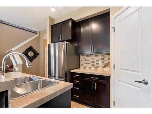 3 Sage Hill Common Nw, Calgary, AB - Indoor Photo Showing Kitchen With Stainless Steel Kitchen With Double Sink