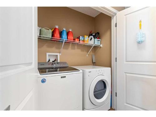 3 Sage Hill Common Nw, Calgary, AB - Indoor Photo Showing Laundry Room