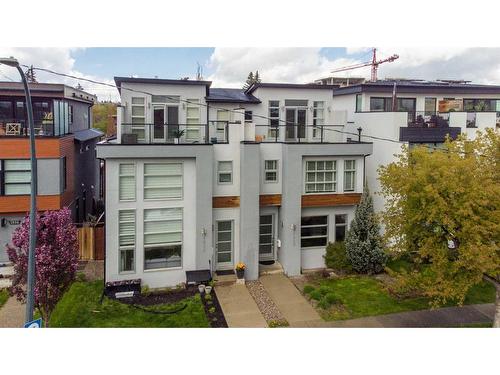 1930 Bowness Road Nw, Calgary, AB - Outdoor With Balcony With Facade