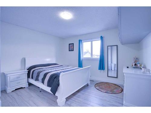 72 Coral Reef Close Ne, Calgary, AB - Indoor Photo Showing Bedroom