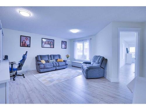 72 Coral Reef Close Ne, Calgary, AB - Indoor Photo Showing Living Room