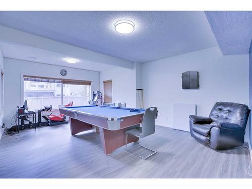 72 Coral Reef Close Ne, Calgary, AB - Indoor Photo Showing Other Room