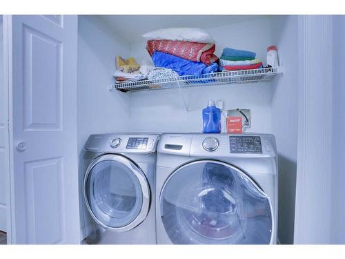 72 Coral Reef Close Ne, Calgary, AB - Indoor Photo Showing Laundry Room