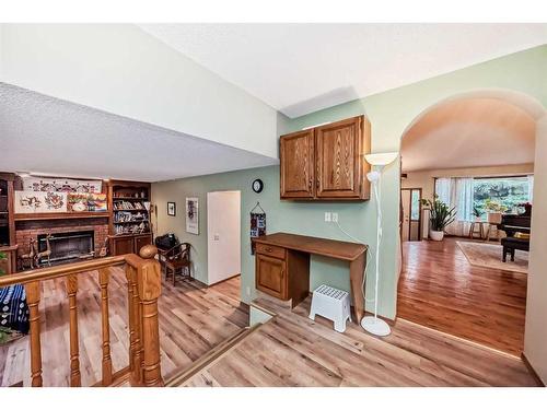 111 Wood Valley Bay Sw, Calgary, AB - Indoor With Fireplace