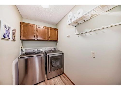 111 Wood Valley Bay Sw, Calgary, AB - Indoor Photo Showing Laundry Room