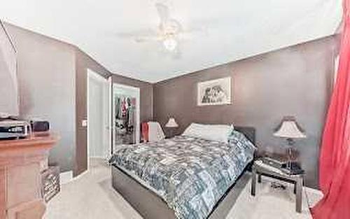 129 Tuscany Valley Green Nw, Calgary, AB - Indoor Photo Showing Bedroom