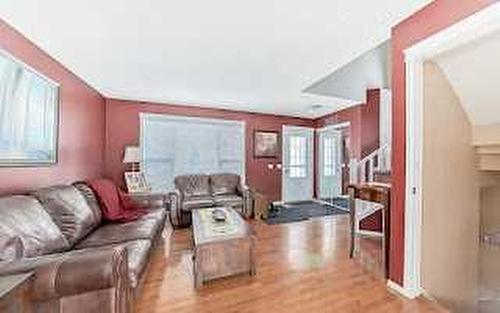 129 Tuscany Valley Green Nw, Calgary, AB - Indoor Photo Showing Living Room