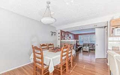 129 Tuscany Valley Green Nw, Calgary, AB - Indoor Photo Showing Dining Room