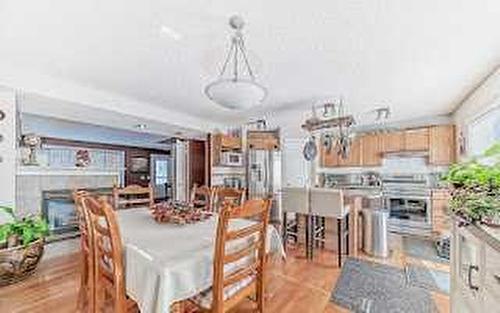 129 Tuscany Valley Green Nw, Calgary, AB - Indoor Photo Showing Dining Room