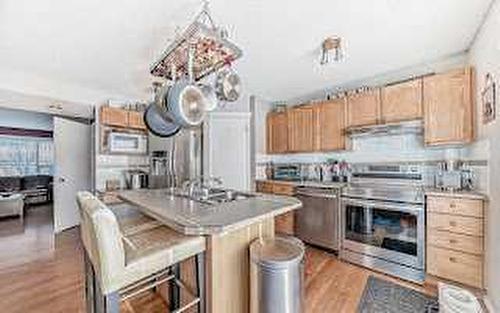 129 Tuscany Valley Green Nw, Calgary, AB - Indoor Photo Showing Kitchen