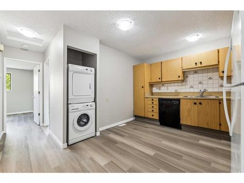 220 Abinger Crescent Ne, Calgary, AB - Indoor Photo Showing Laundry Room
