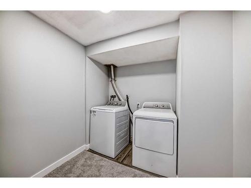 53 Templemont Drive Ne, Calgary, AB - Indoor Photo Showing Laundry Room