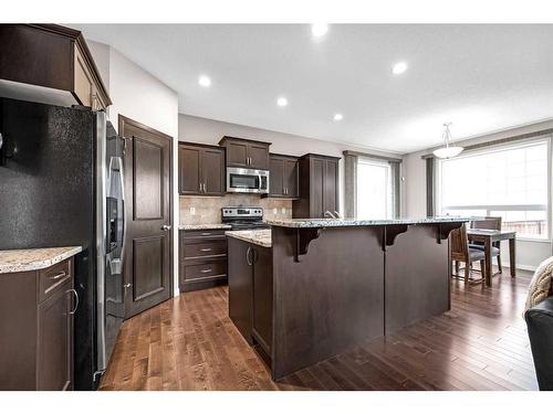 217 Cranarch Close Se, Calgary, AB - Indoor Photo Showing Kitchen With Upgraded Kitchen